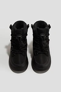 Bottines imperméables et chaudement doublées