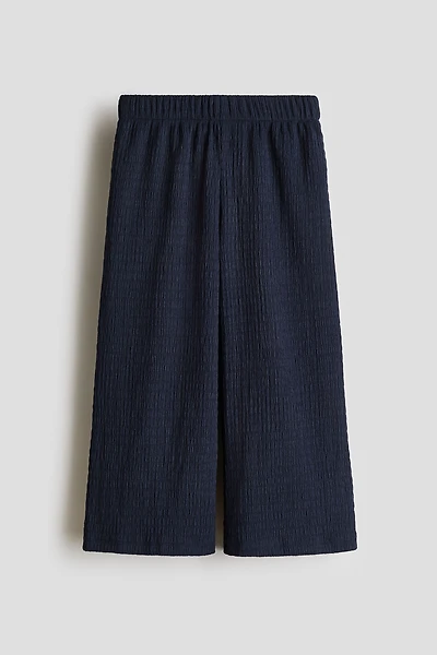 Pantalon large à effet froissé