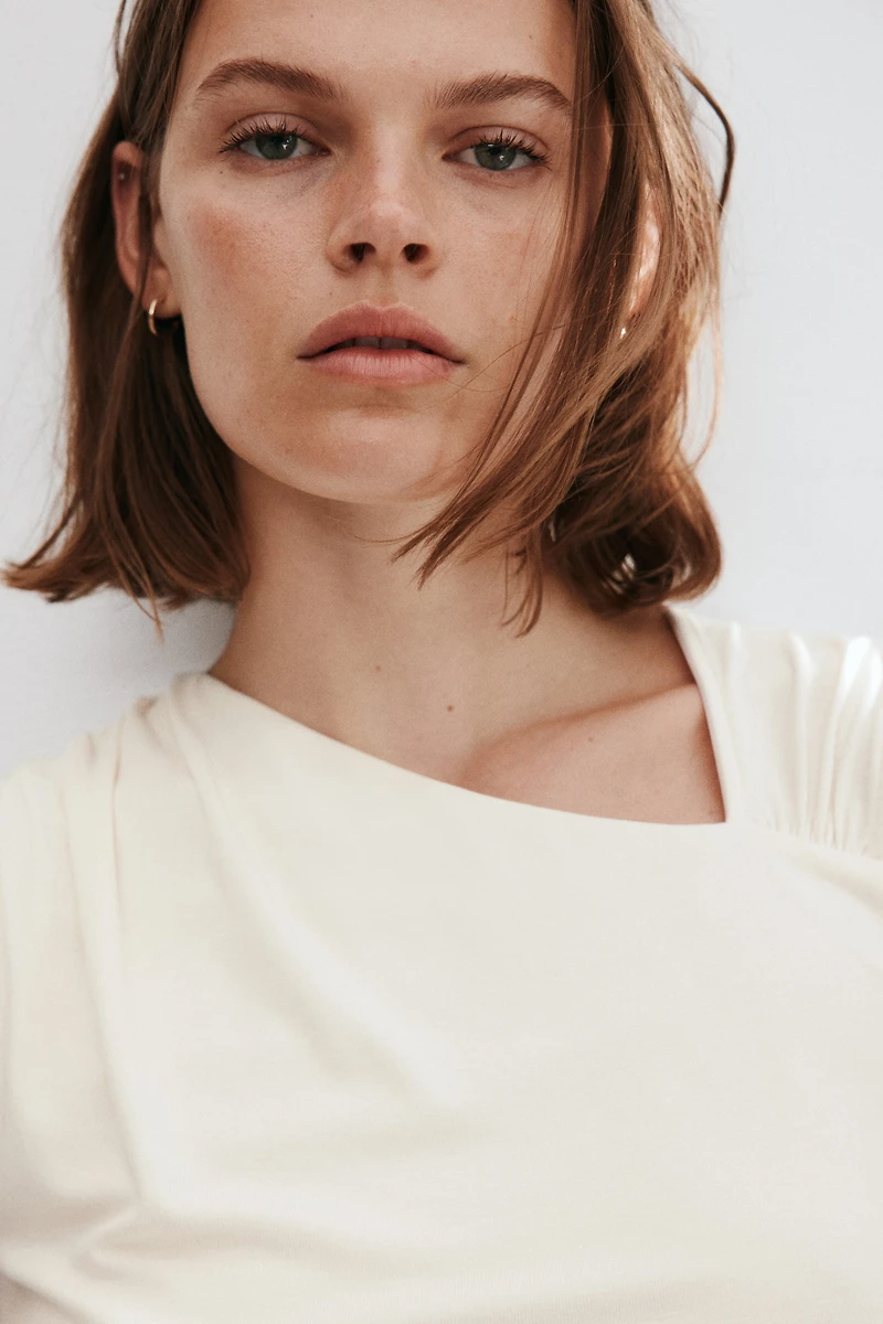 Draped Asymmetric Top