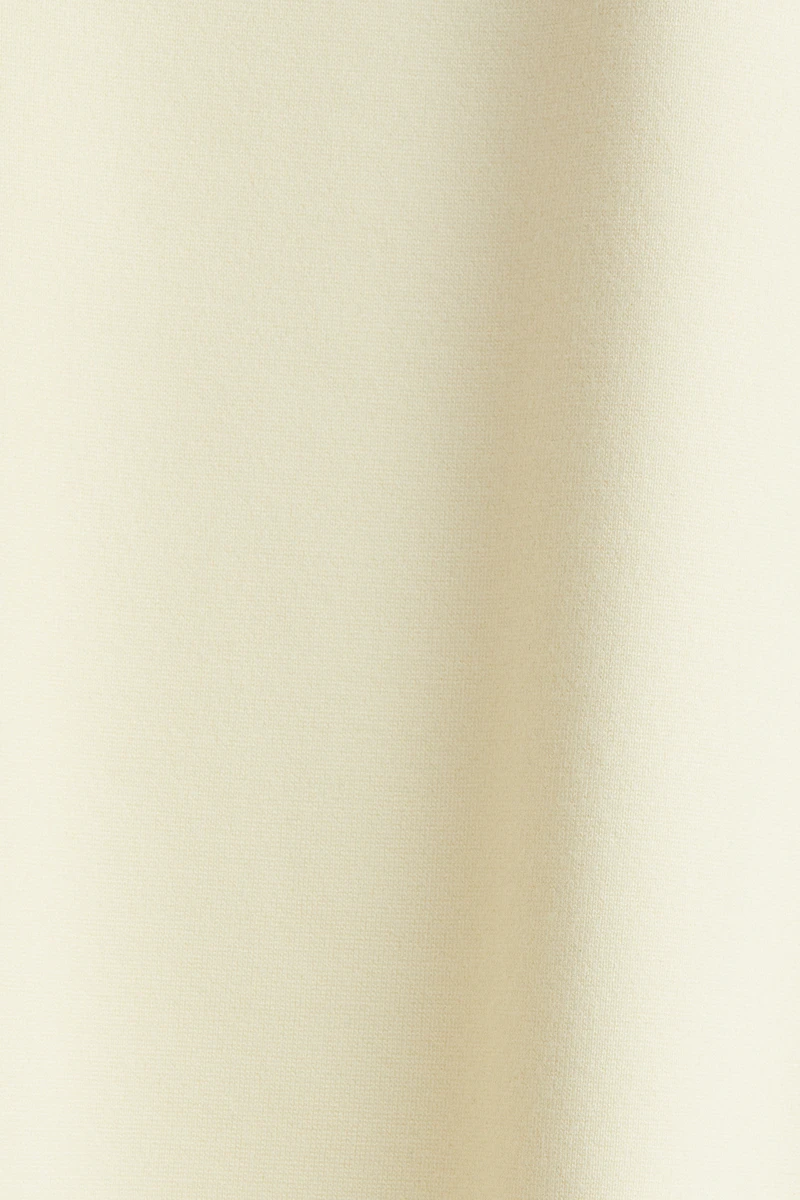Interlock Sleeveless Peplum Top