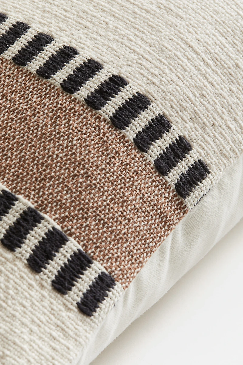 Housse de coussin à motif