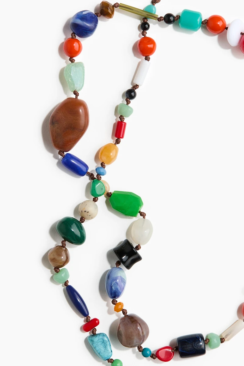 Long collier avec perles fantaisie