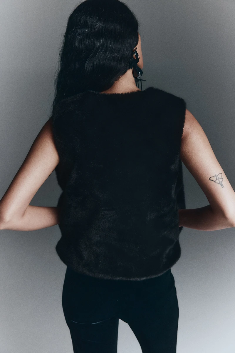 Veste sans manches duveteuse