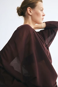 Blouse à encolure bénitier en fin tricot