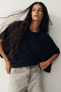 Haut à manches chauve-souris en tricot