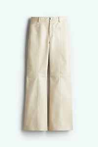 Pantalon en tissu enduit