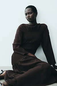 Robe avec nid d'abeille