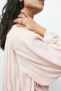 Robe drapée avec détail noué