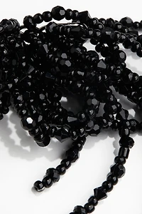 Collier asymétrique avec perles fantaisie