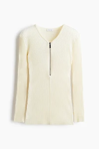 Haut côtelé avec col à fermeture éclair