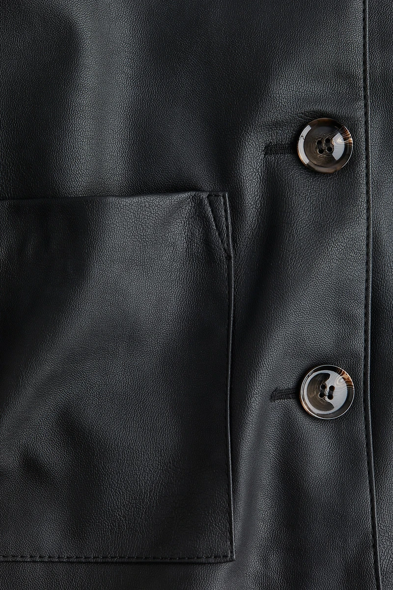 Veste en tissu enduit