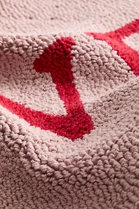 Housse de coussin aiguilletée