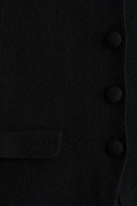 Gilet en tricot côtelé à encolure dégagée