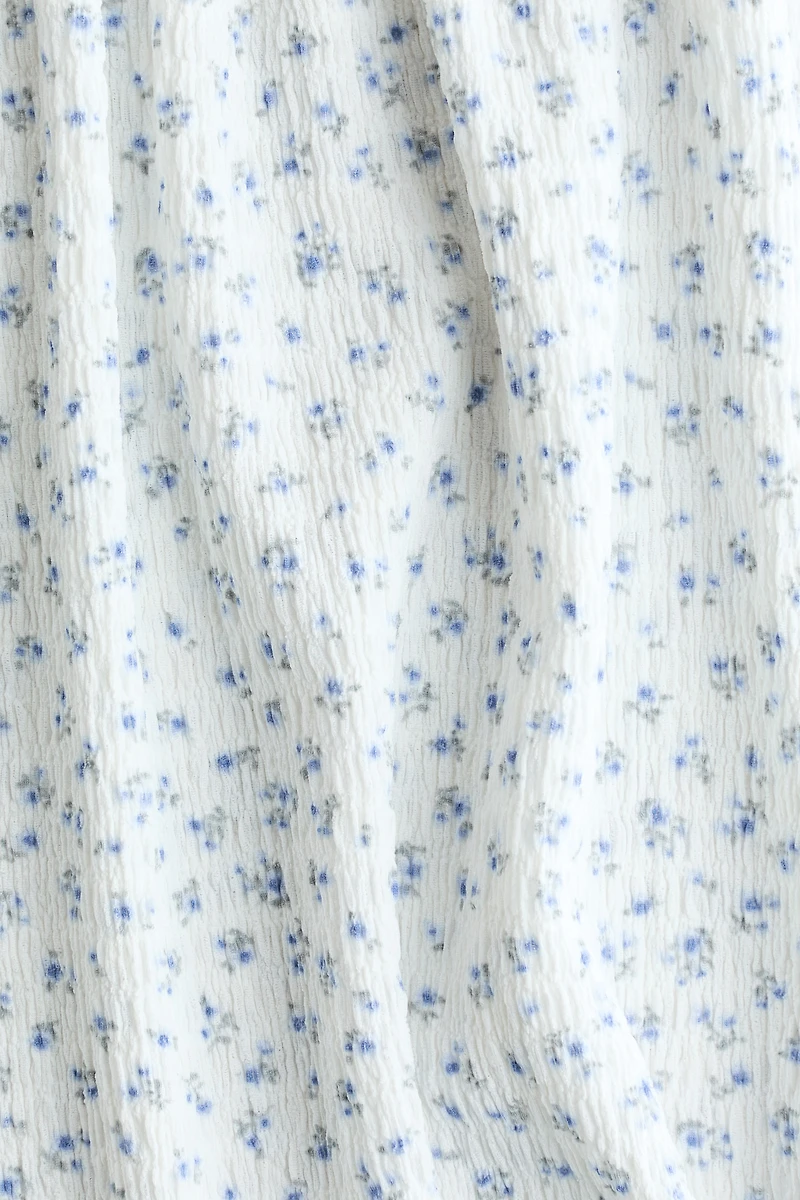 Robe à corsage en nid d'abeille