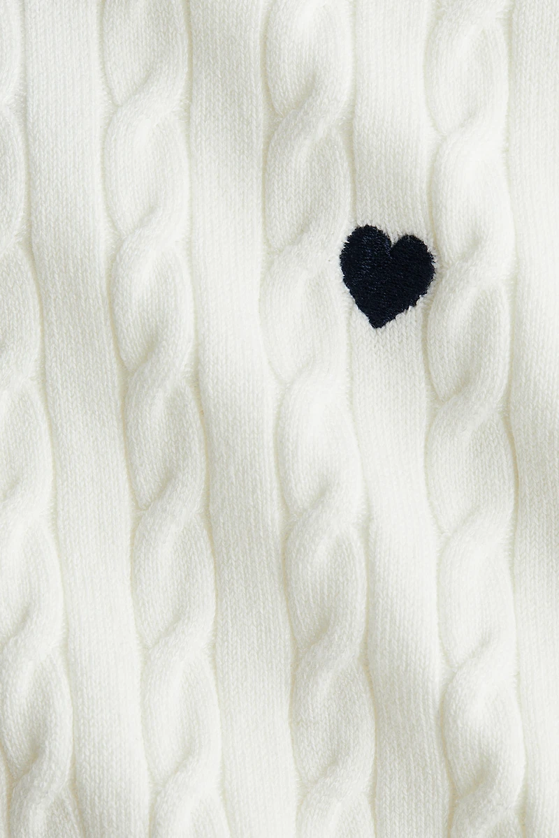 Chandail en tricot torsadé