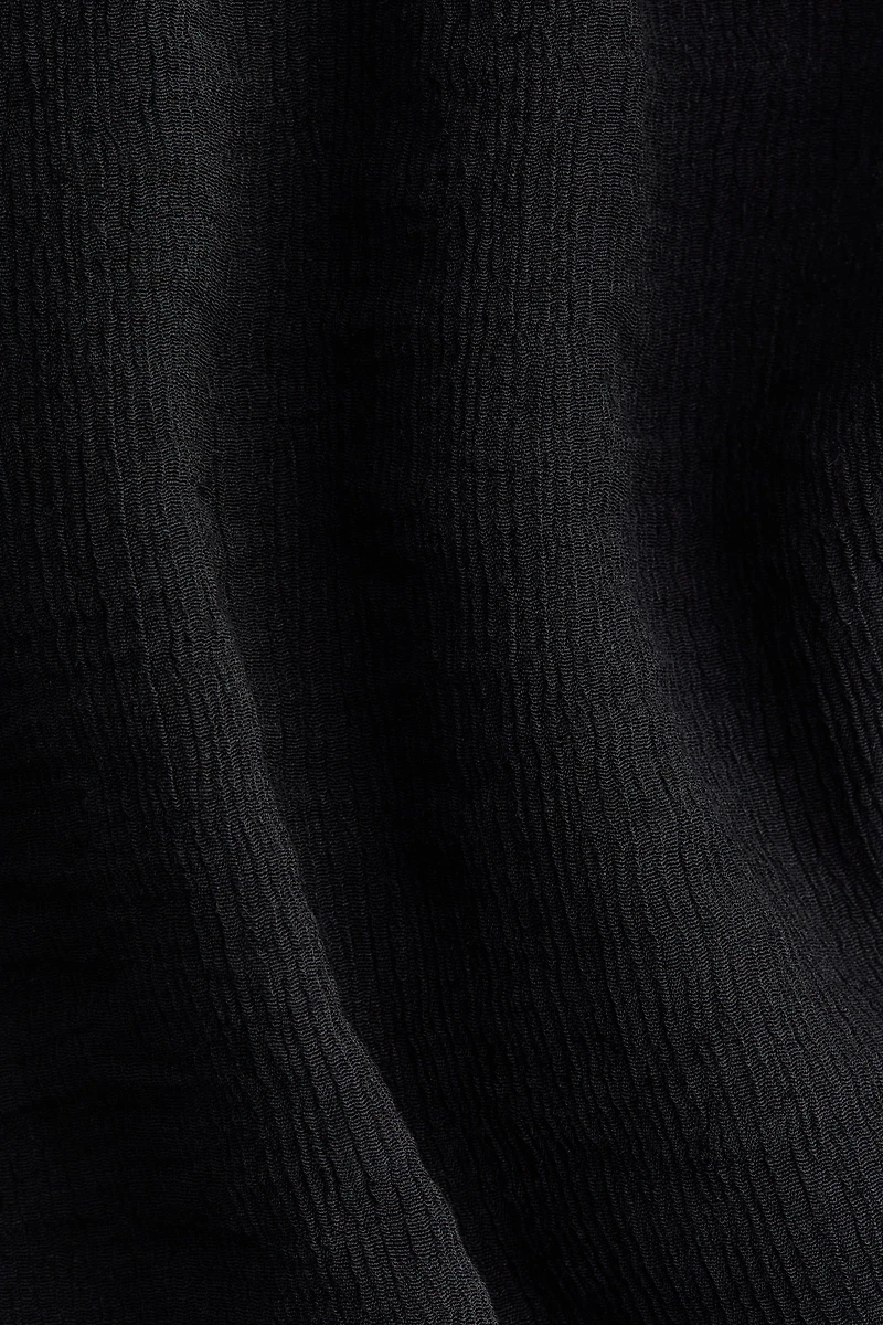 Frill-trimmed bow-collar top