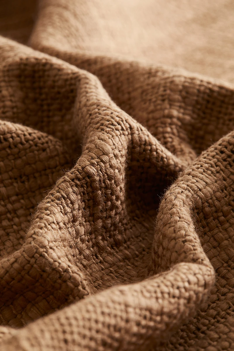 Housse de coussin en tissu flammé