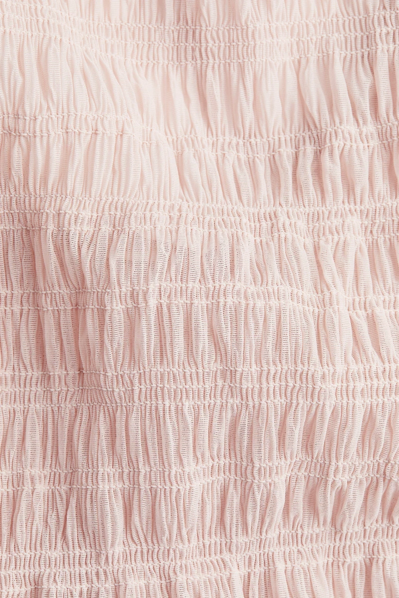Smocked Peplum Top