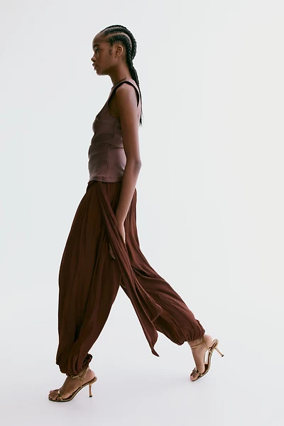 Pantalon à jambes ballon avec panneau drapé