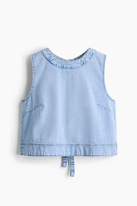 Haut en denim avec dos ouvert