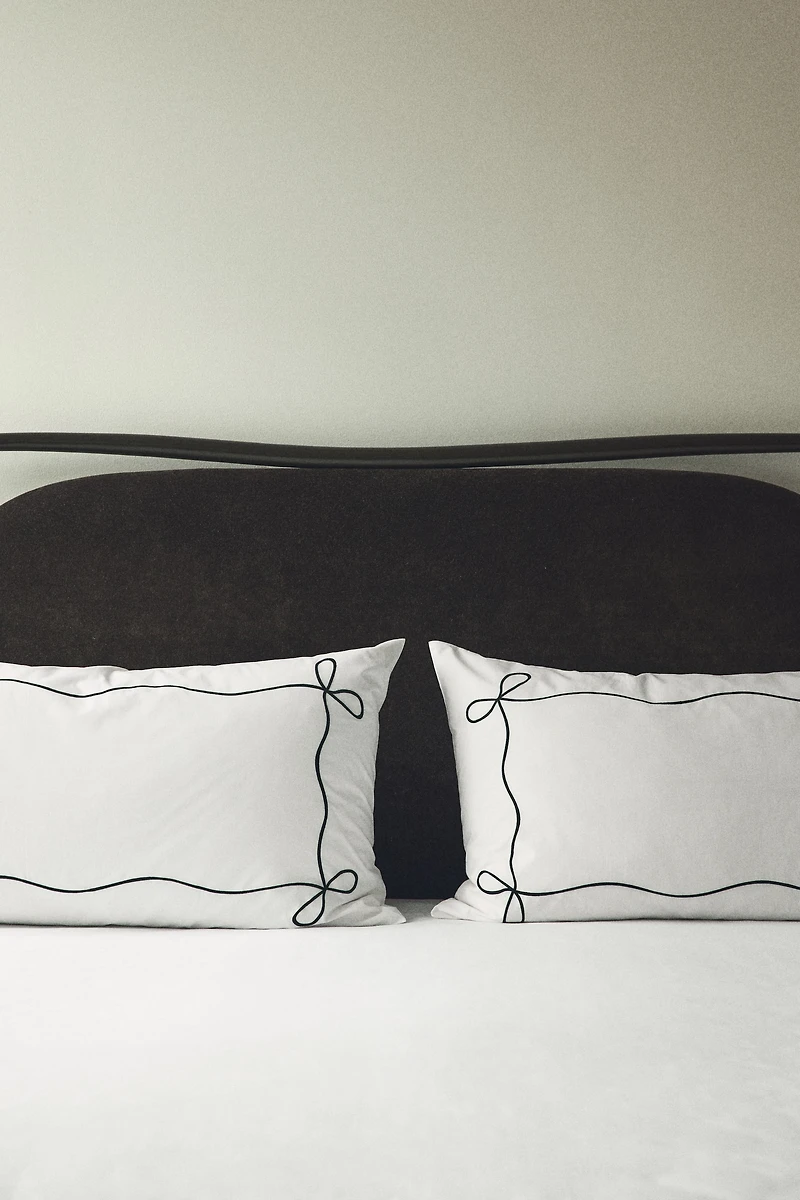 Taie d'oreiller brodée en percale de coton