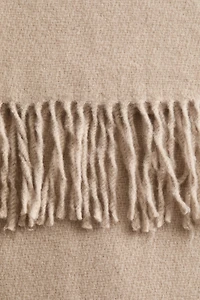 Couverture à franges en laine mélangée