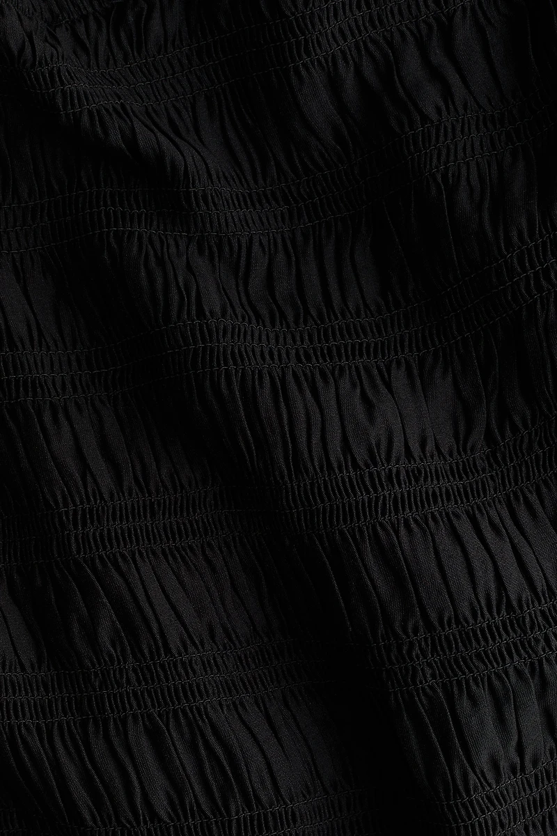 Blouse épaules nues smockée