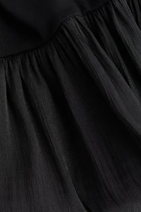 Haut à bord bouffant