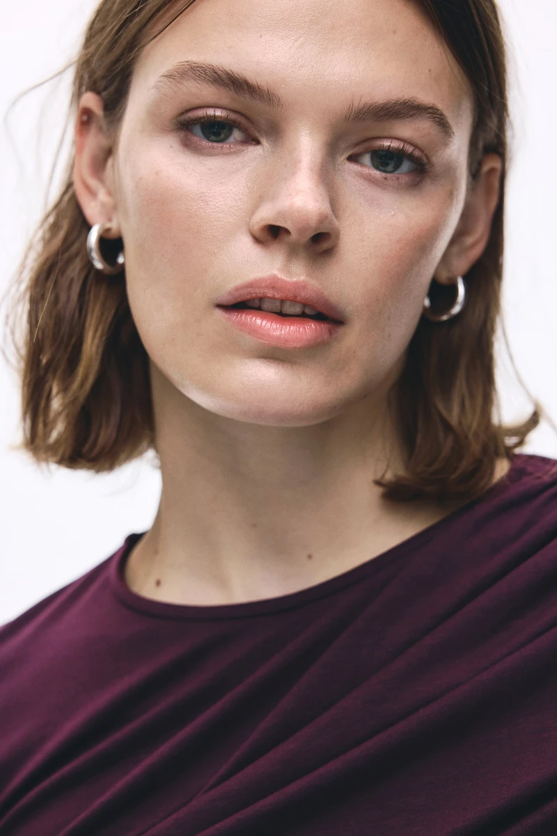 Draped Asymmetric Top