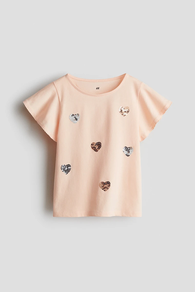 Haut avec motifs à sequins