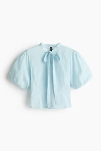Blouse à manches bouffantes