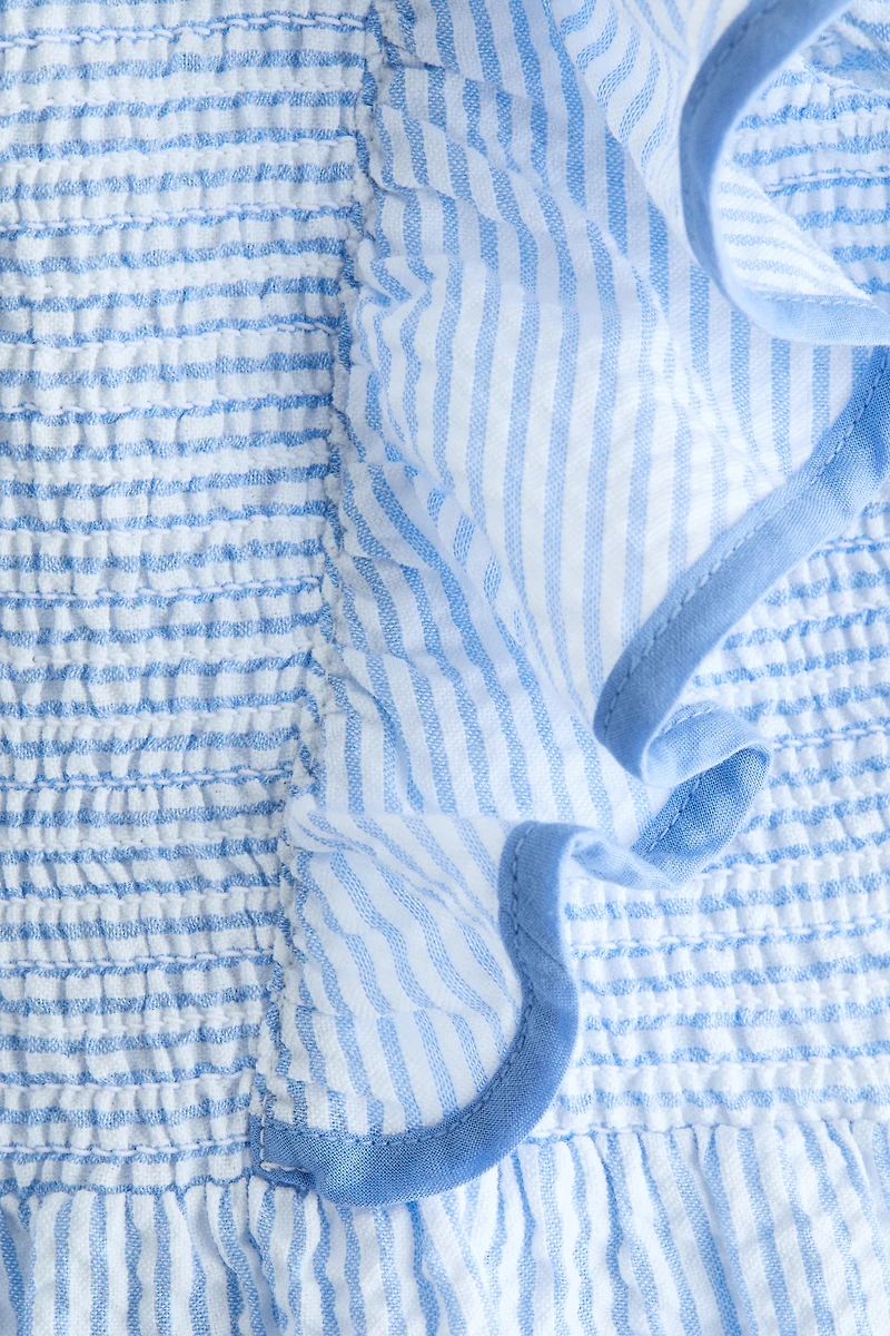 Robe smockée à volants