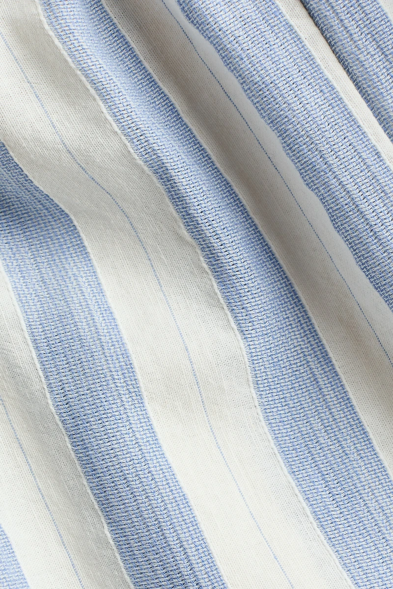 Flutter-Sleeved Jumpsuit