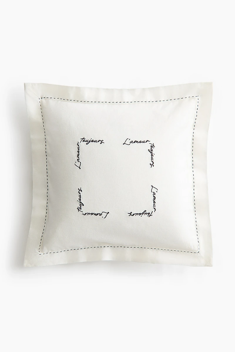 Housse de coussin en lin mélangé avec détail brodé