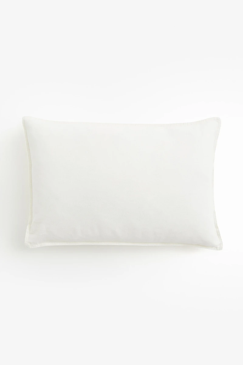 Housse de coussin en lin mélangé