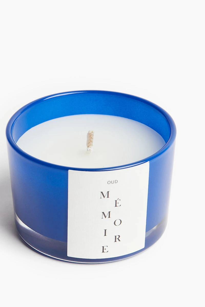 Bougie parfumée dans un pot en verre