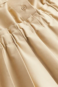 Robe utilitaire avec jupe plissée