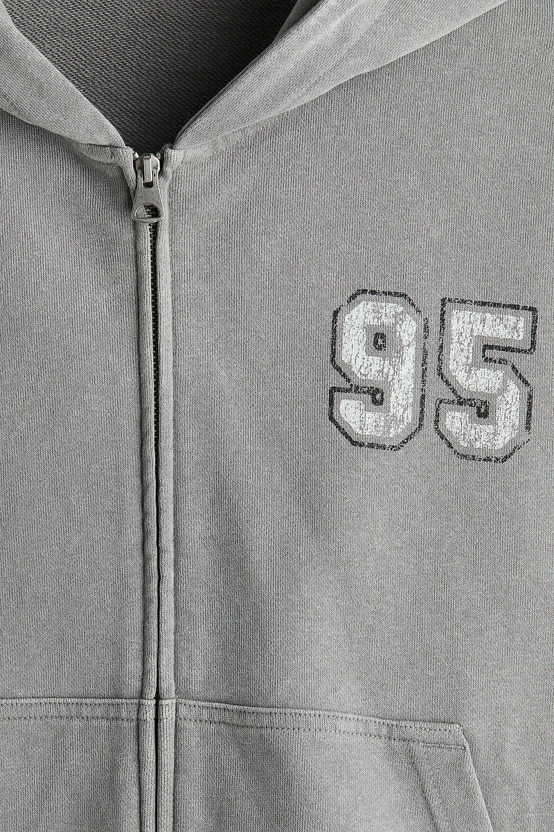 Veste kangourou carrée ample à fermeture éclair