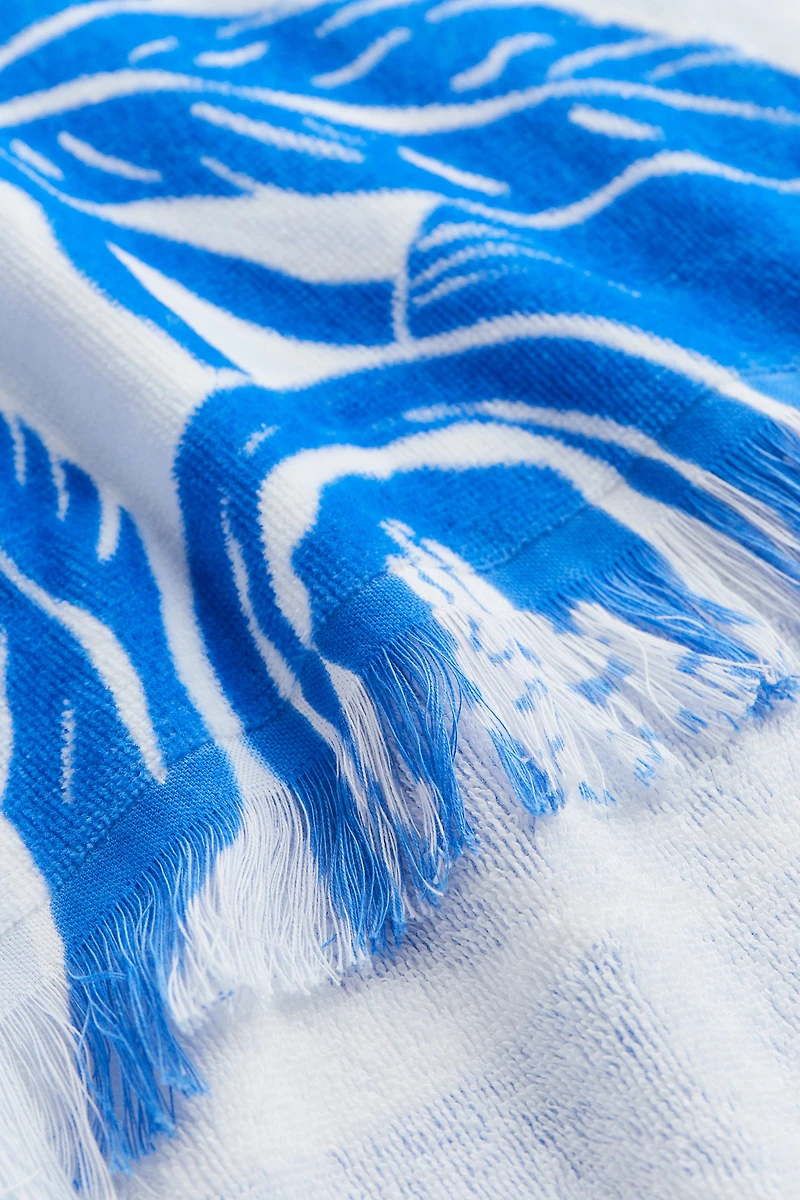 Serviette de plage à motif