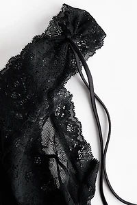 Maillot en dentelle à décolleté plongeant