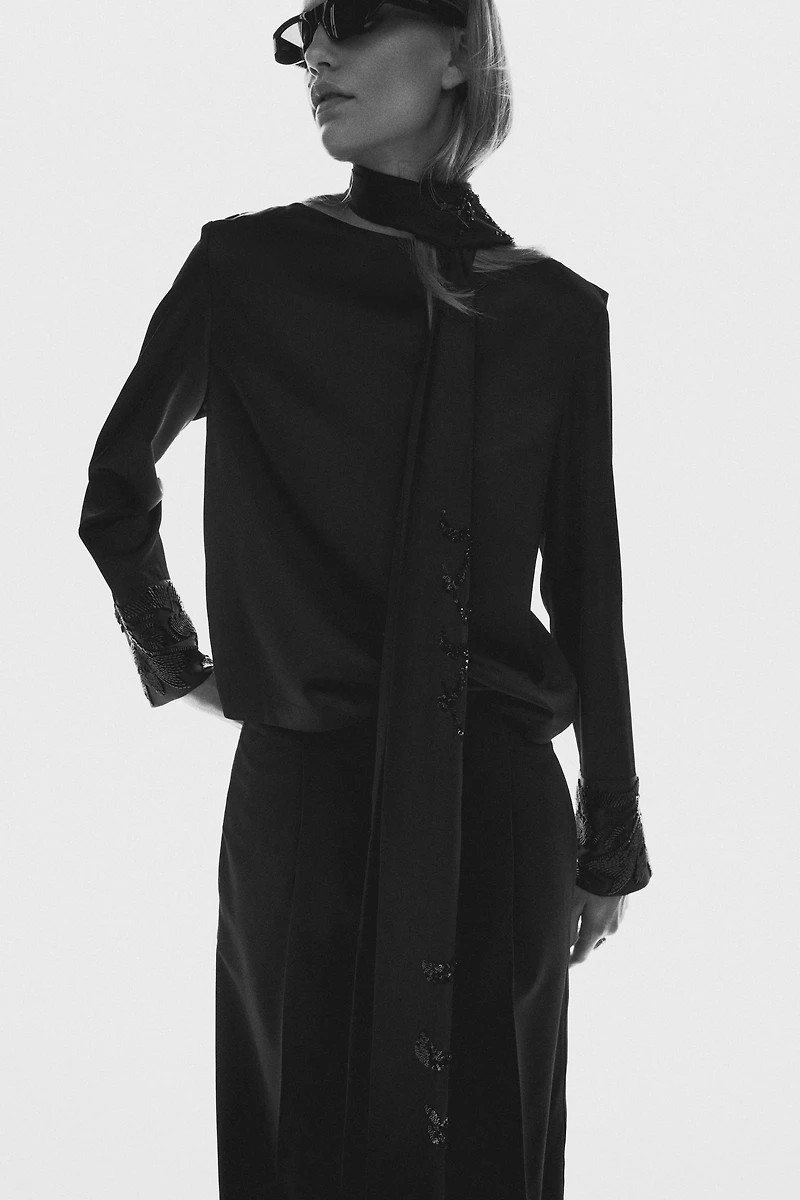 Blouse à dos bénitier avec perles de fantaisie