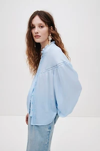 Blouse à volants avec manches ballon