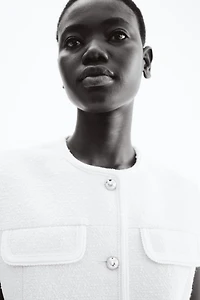 Gilet sans manches en bouclé