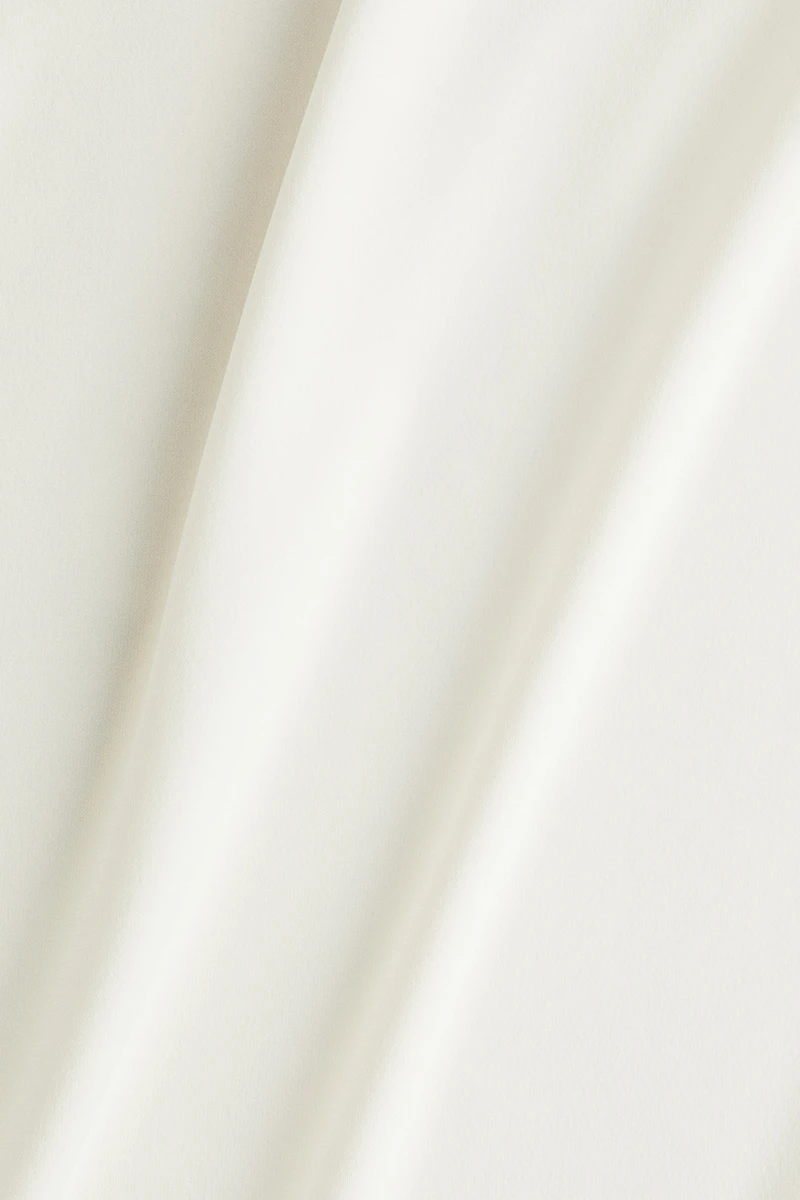 Sleeveless Mock Turtleneck Top