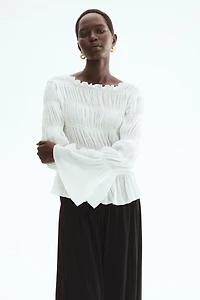 Haut nid d'abeille à encolure bateau