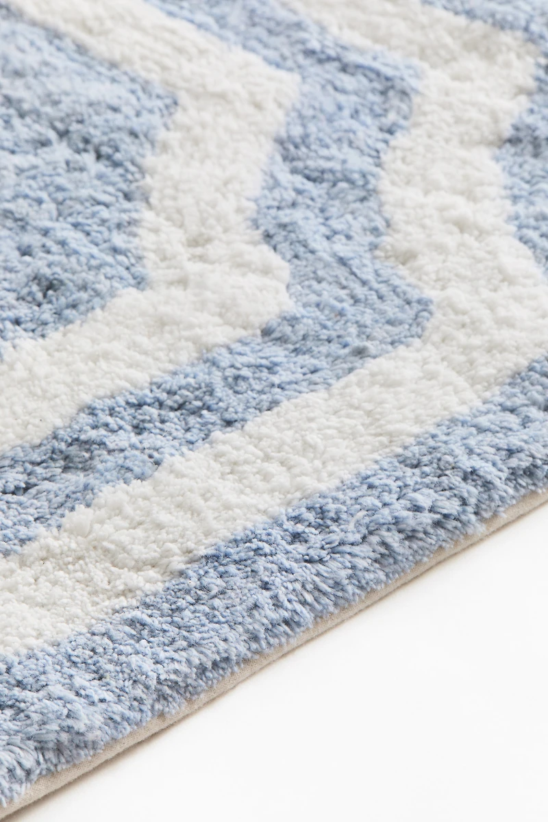 Tapis de bain en coton touffeté