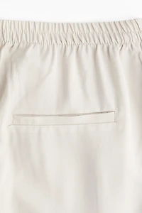 MAMA Pantalon droit en sergé