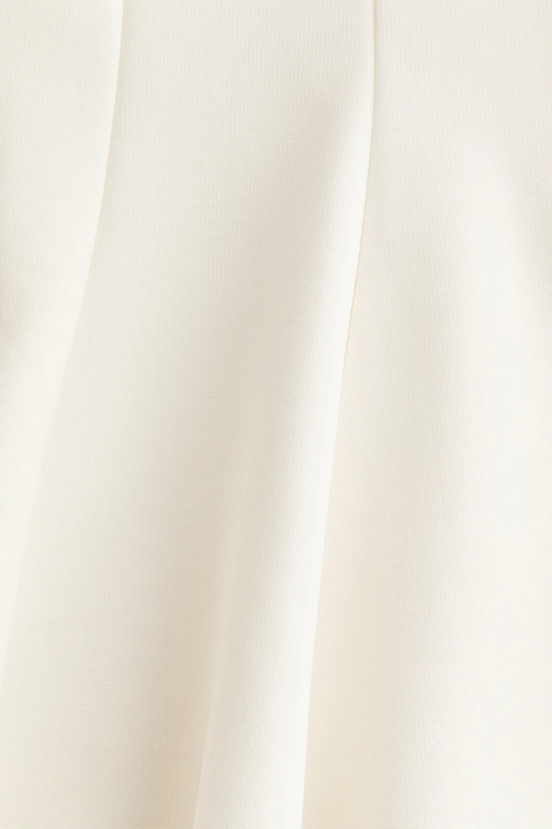 Haut péplum sans manches