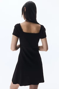 Lace-Trimmed Dress with Flared Skirt