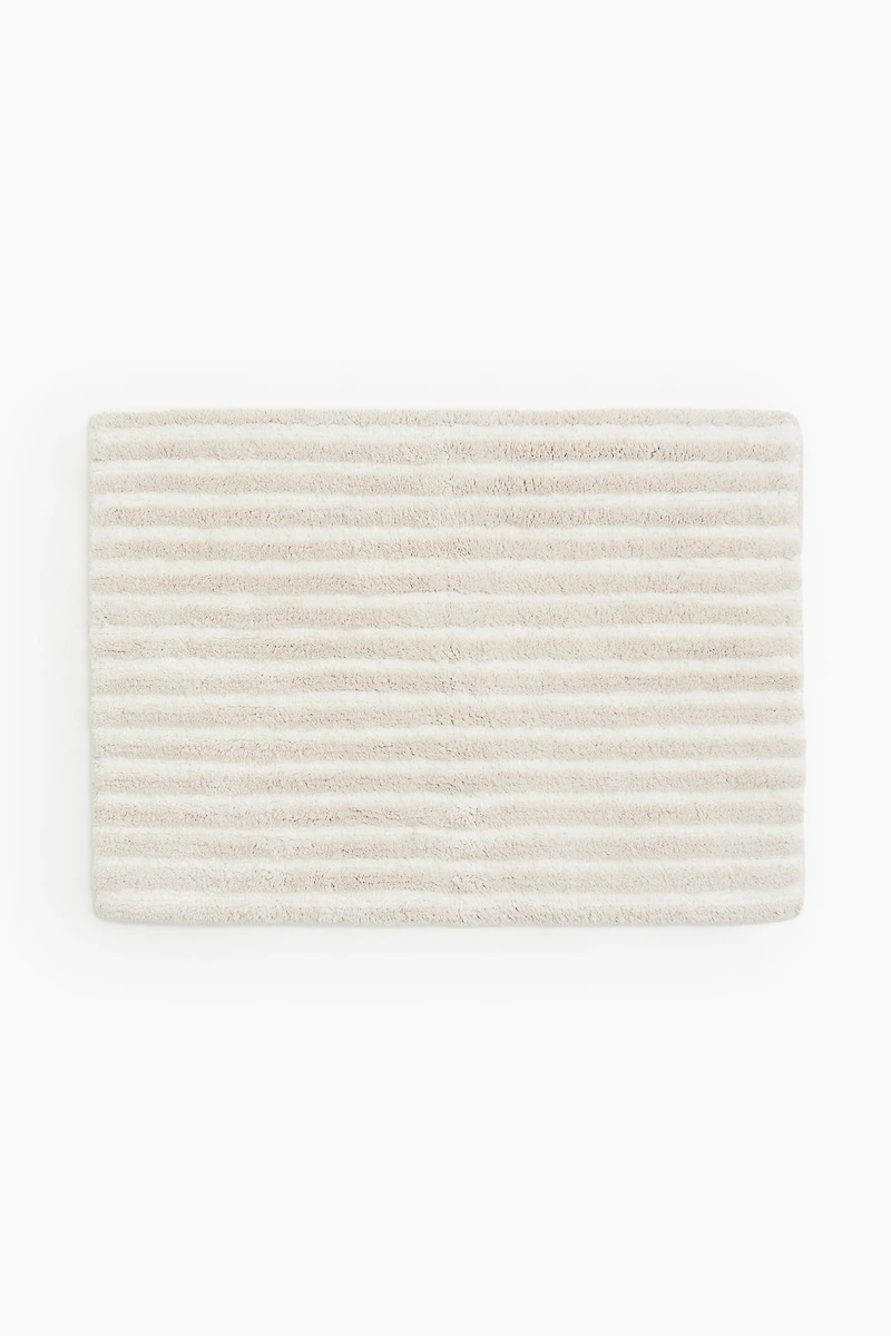 Tapis de bain en coton touffeté